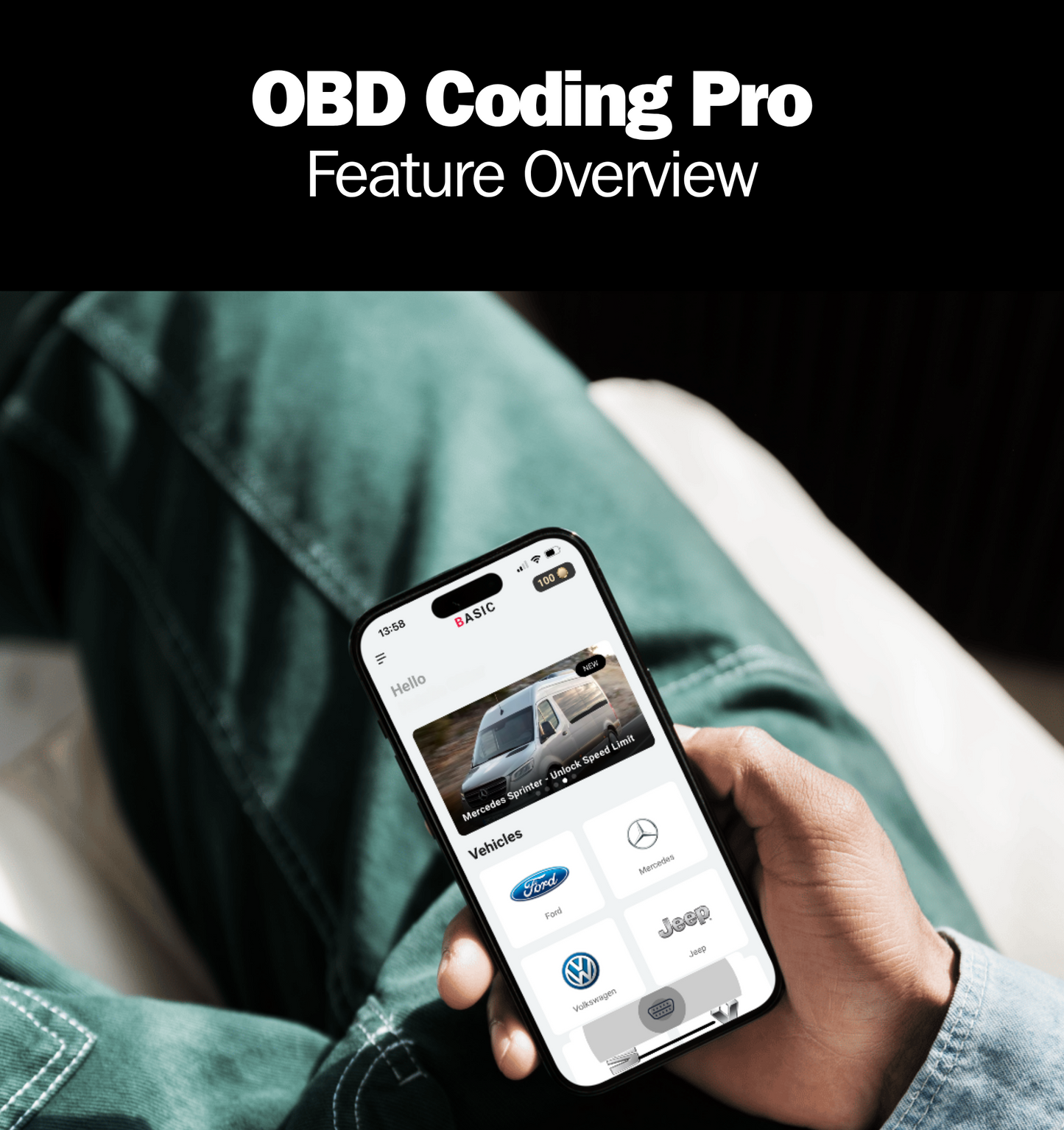 Hand holding a smartphone with an app interface, likely OBD Coding Pro, on a blurred background.